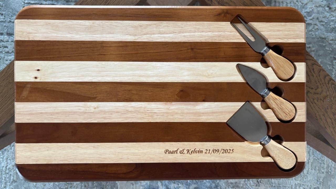 Personalized wooden serving board engraved by Chancor